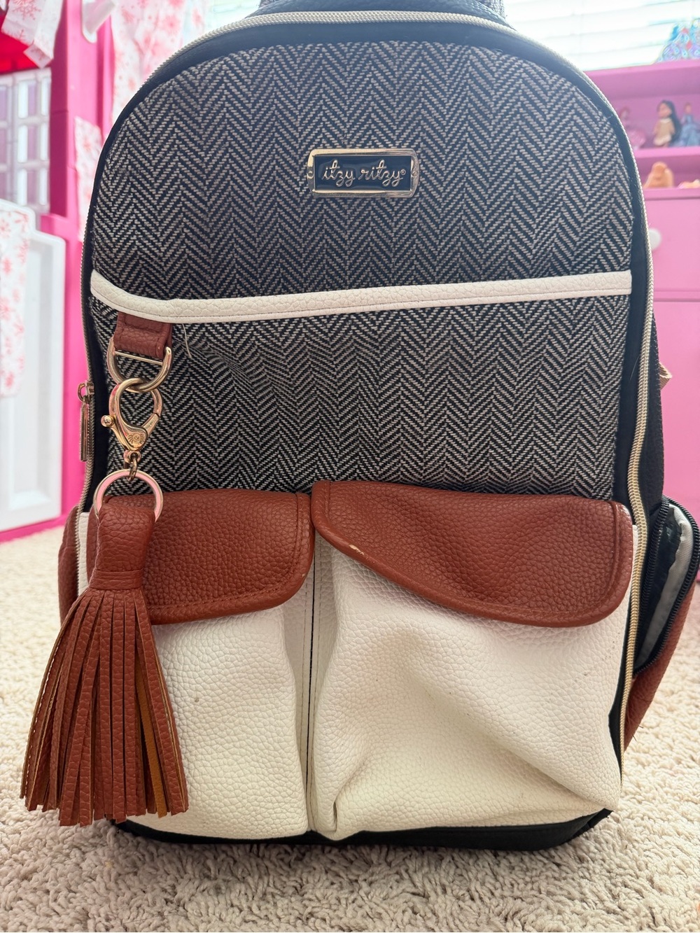 Itzy Ritzy Black-and-White Herringbone Diaper Backpack with Brown Accents
